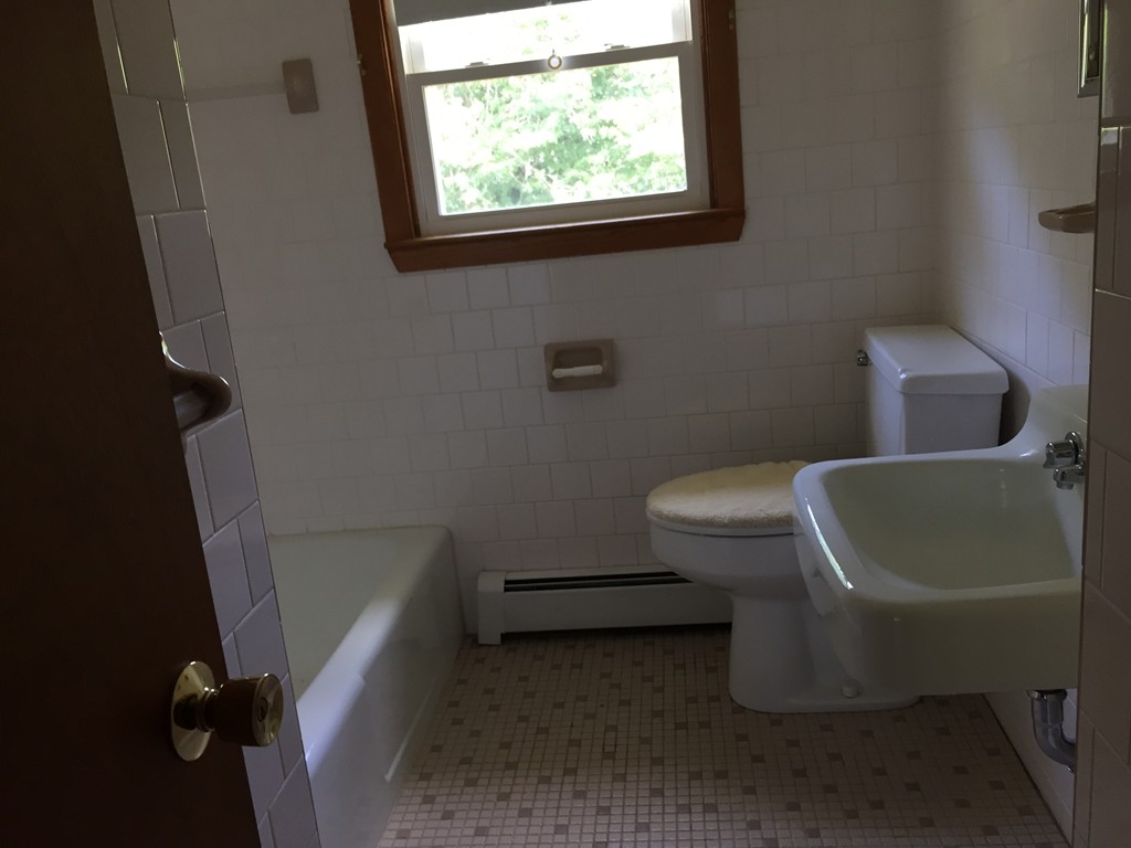 33 Robinwood Road Wareham, MA 02532 - Photo 6 of 13 a bathroom with a toilet and a sink