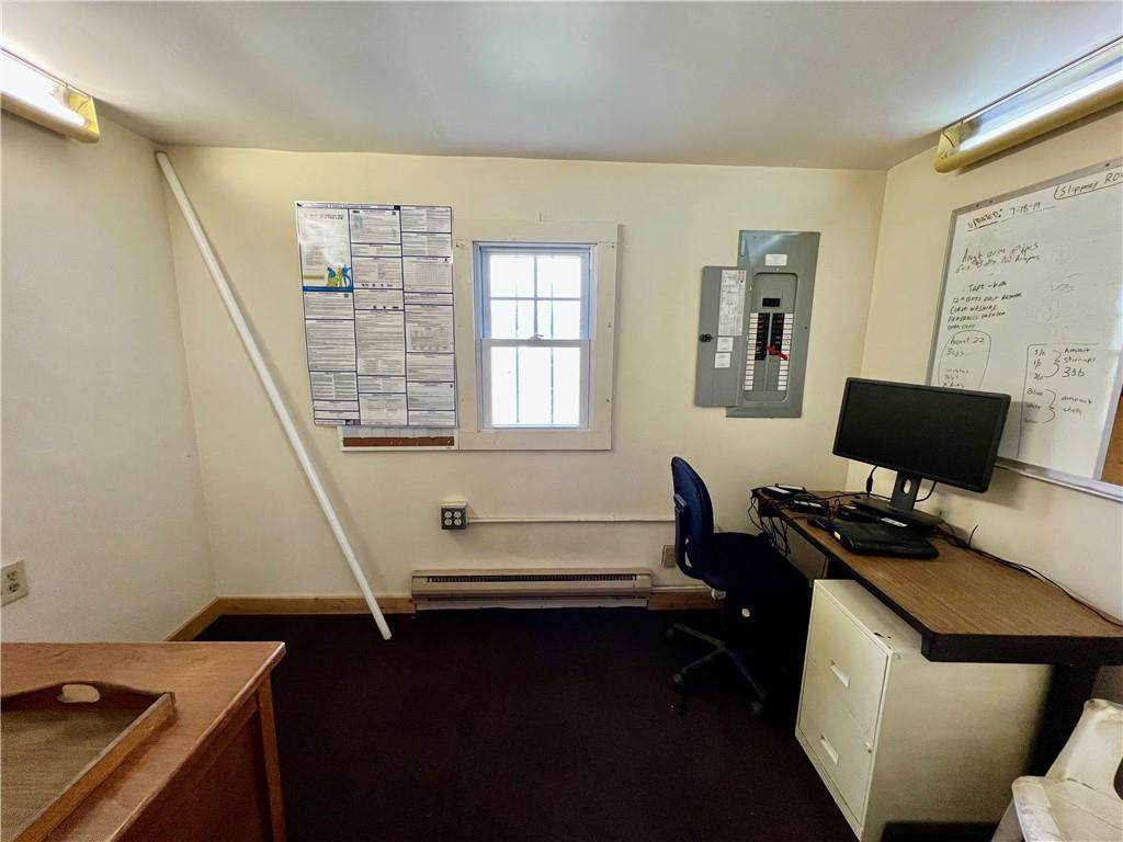 4772 Harlansburg Road Slippery Rock, PA 16057 - Photo 8 of 9 a work room with furniture and a window