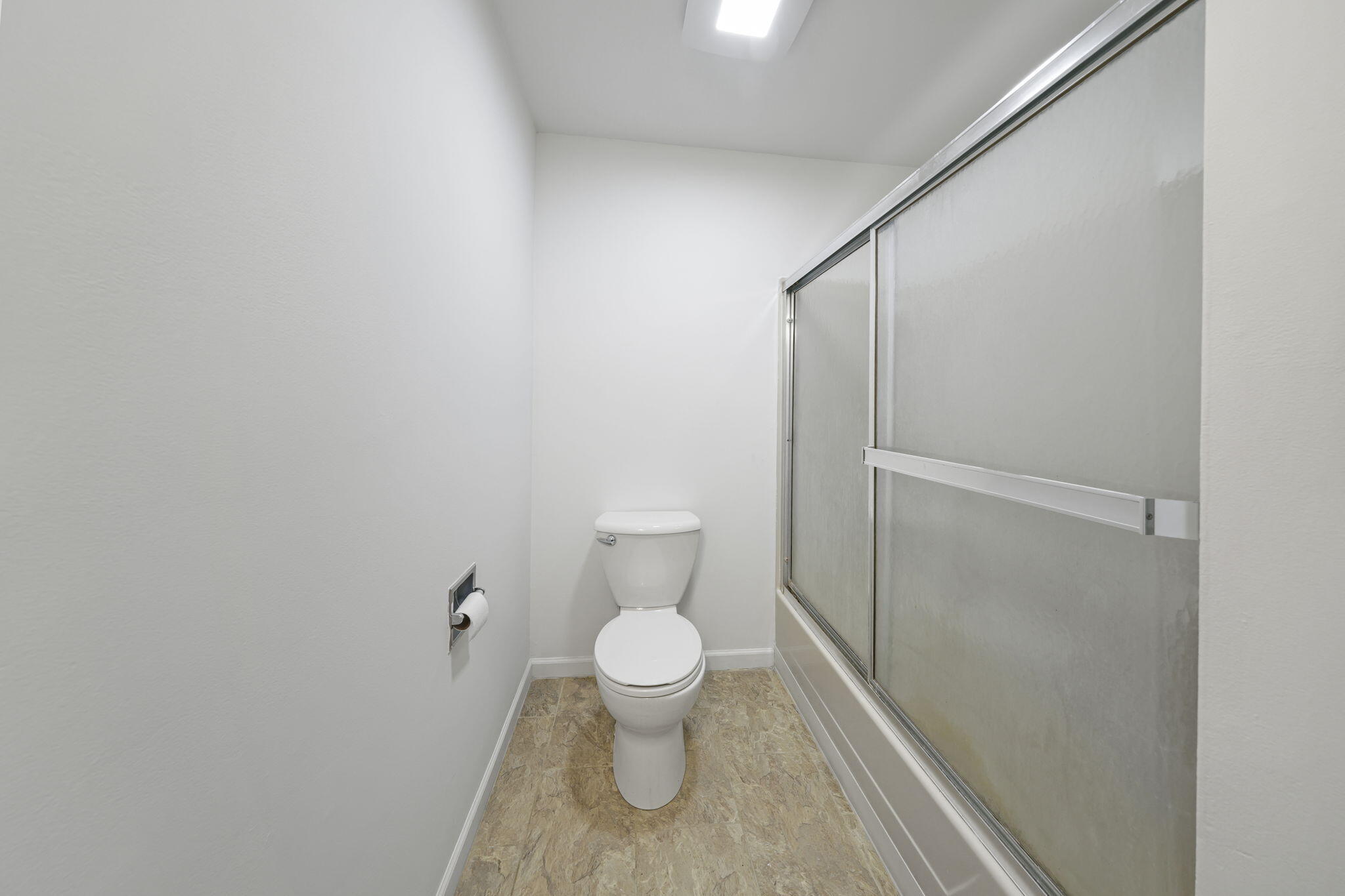 361 Locust Street, Unit 4 Valparaiso, IN 46383 - Photo 10 of 10 a bathroom with a toilet and a shower