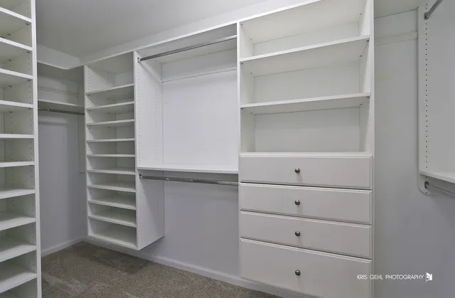 a view of an empty walk in closet