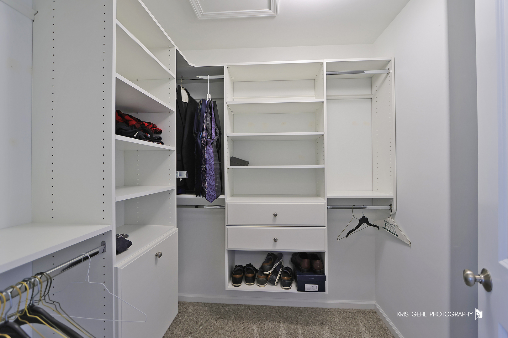 10718 Hunt Club Road Richmond, IL 60071 - Photo 17 of 28 a view of walk in closet with clothes and shoes