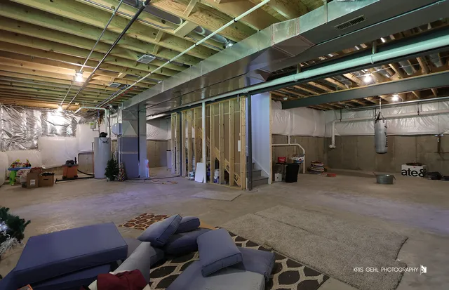 a view of a wooden deck with a big yard