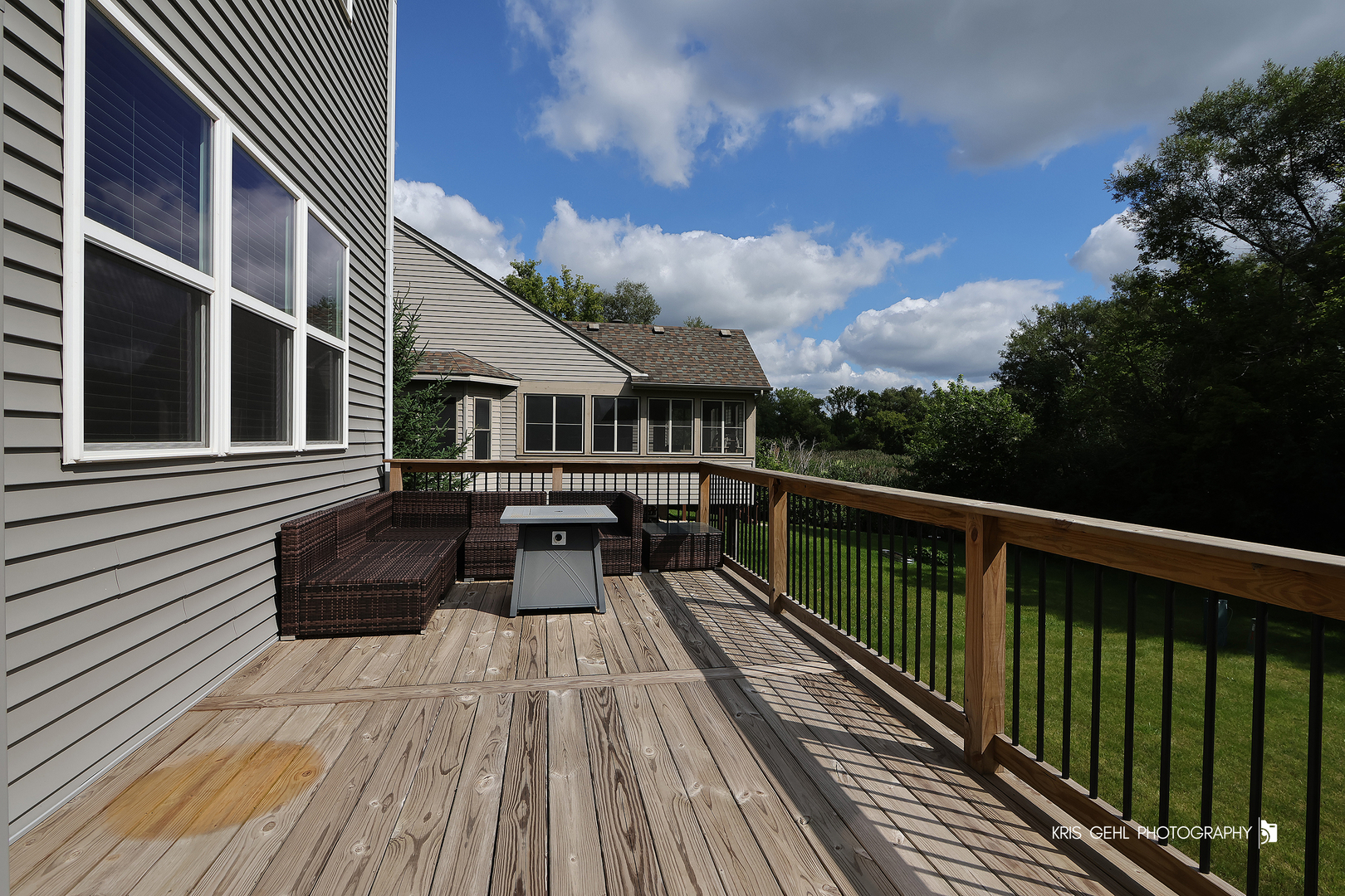 10718 Hunt Club Road Richmond, IL 60071 - Photo 25 of 28 a view of a house with wooden deck