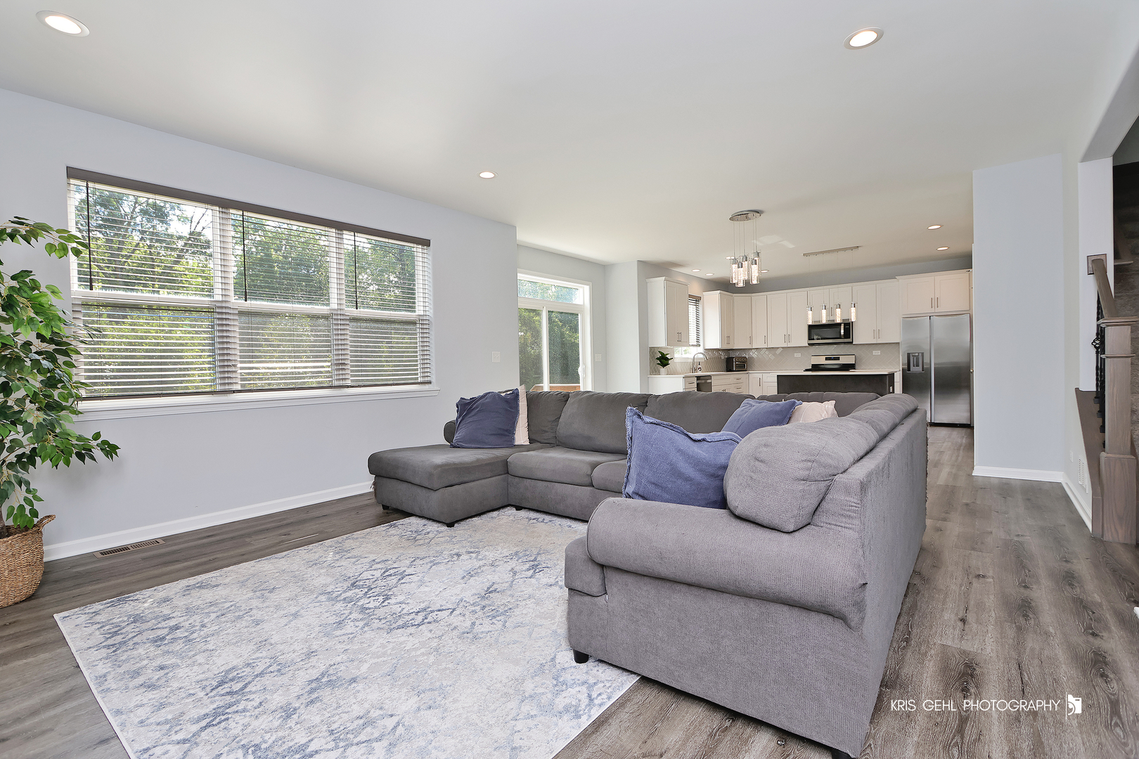 10718 Hunt Club Road Richmond, IL 60071 - Photo 6 of 28 a living room with furniture and a large window