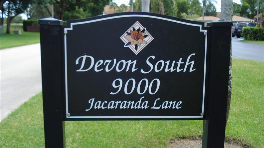 a view of outdoor space with a sign broad