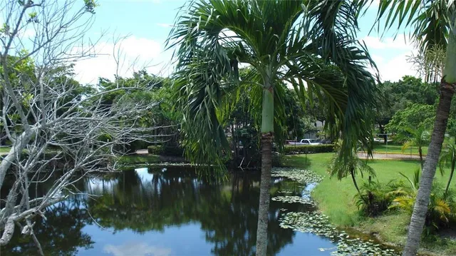 a lake view with a yard