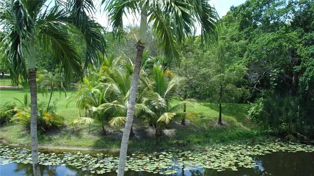 a backyard of a building with lots of green space