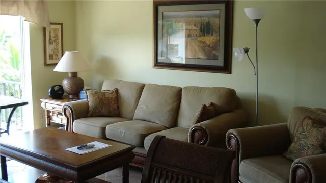 a living room with furniture and a couch