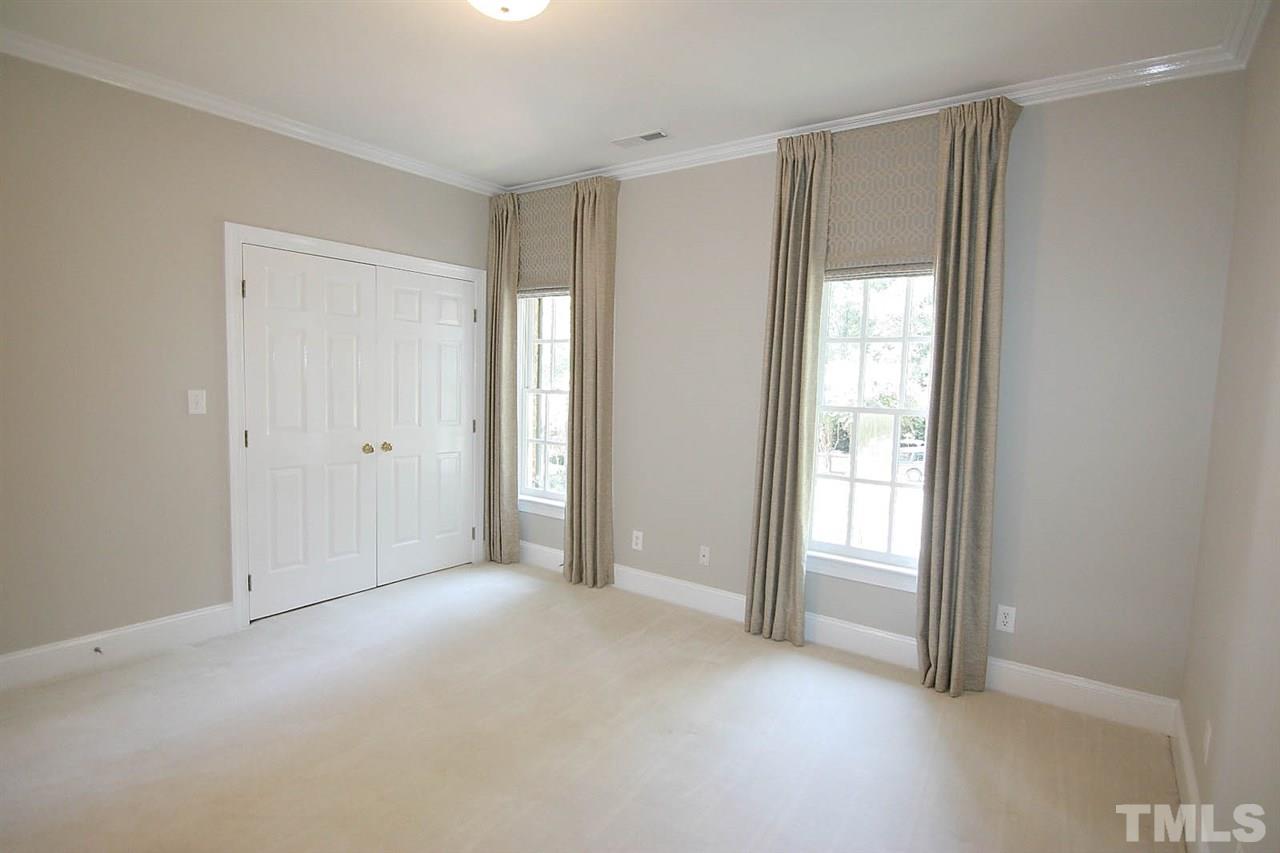 601 Chalfant Court Raleigh, NC 27607 - Photo 23 of 24 an empty room with windows and closet