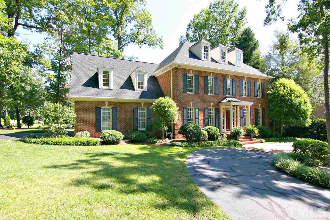601 Chalfant Court Raleigh, NC 27607 - Photo 3 of 24 a front view of a house with a yard