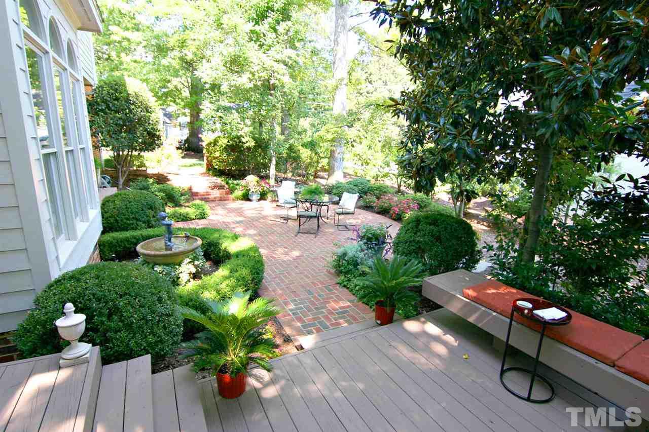 601 Chalfant Court Raleigh, NC 27607 - Photo 6 of 24 a backyard of a house with outdoor seating