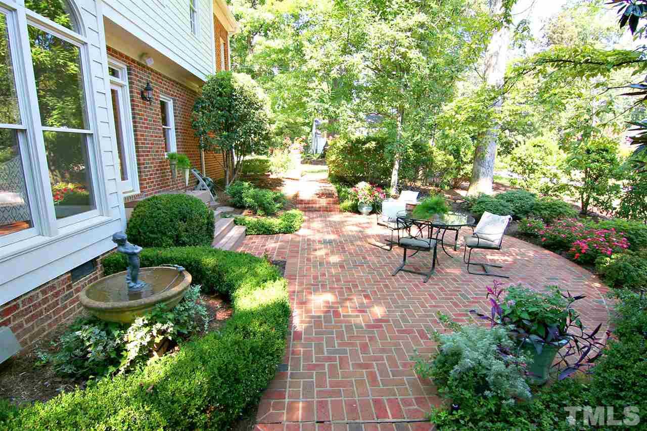 601 Chalfant Court Raleigh, NC 27607 - Photo 8 of 24 a view of a patio with chairs and table in a patio