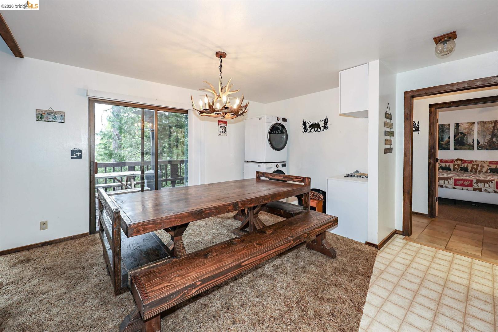 26600 Inyo Drive Cold Springs, CA 95335 - Photo 7 of 38 a living room with furniture and a chandelier