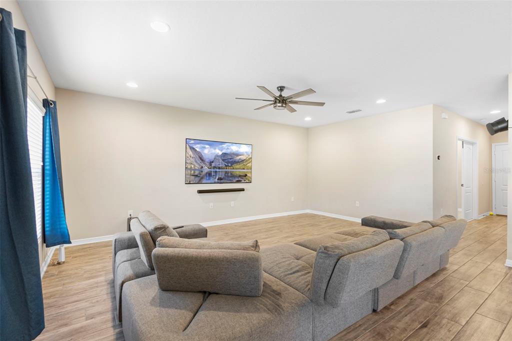 3937 Ceremony Cove Sanford, FL 32771 - Photo 11 of 51 a living room with furniture and a ceiling fan