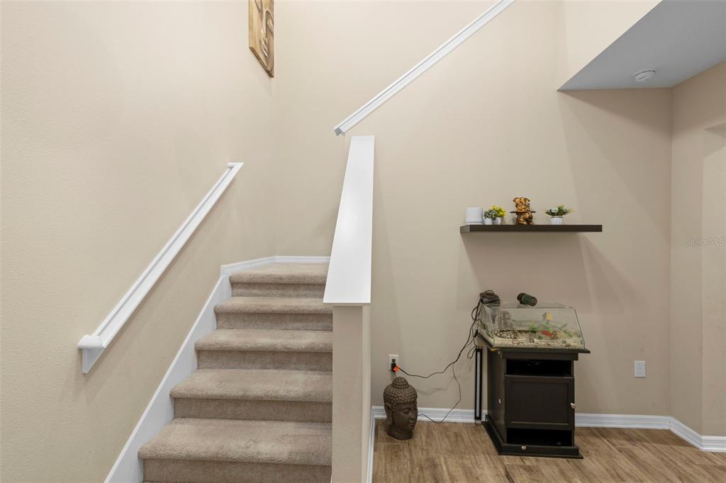 3937 Ceremony Cove Sanford, FL 32771 - Photo 14 of 51 a view of entryway and hall with wooden floor