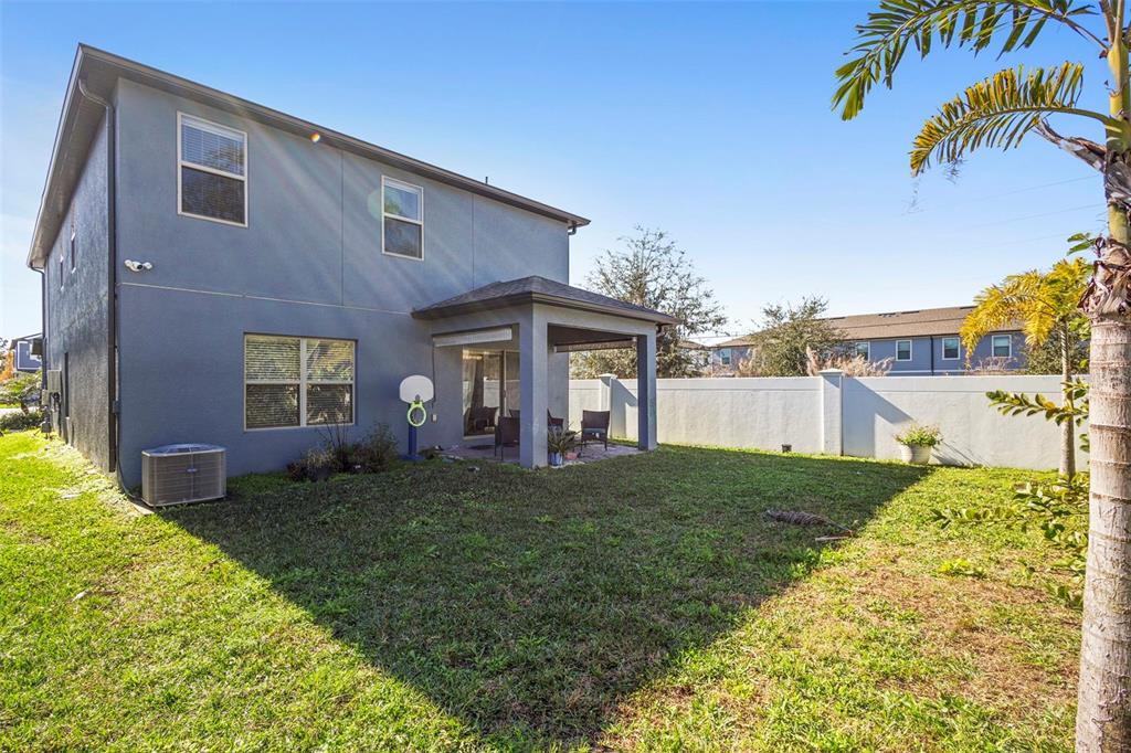 3937 Ceremony Cove Sanford, FL 32771 - Photo 35 of 51 a view of a yard in front of a house