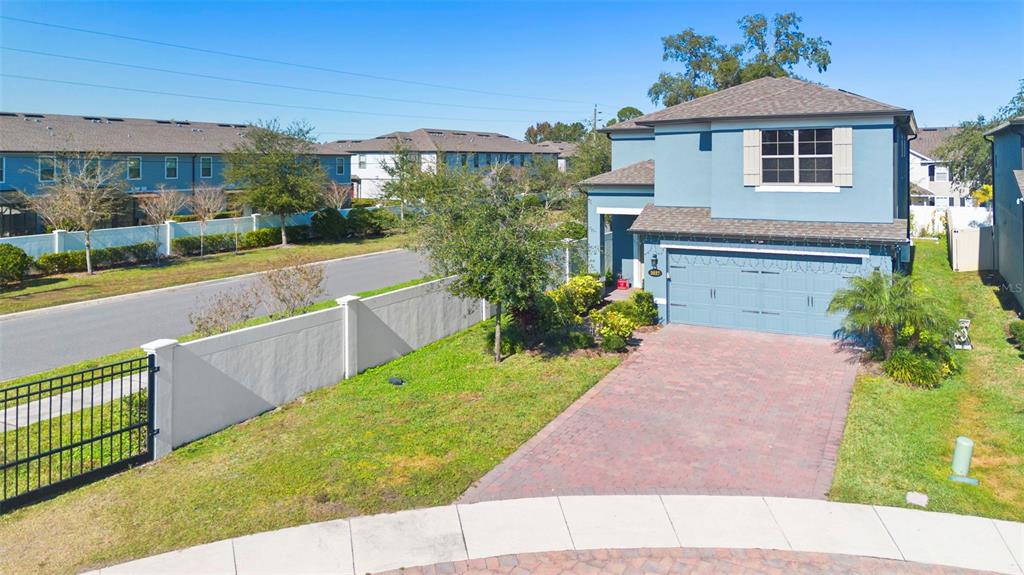 3937 Ceremony Cove Sanford, FL 32771 - Photo 39 of 51 a front view of house with yard and green space