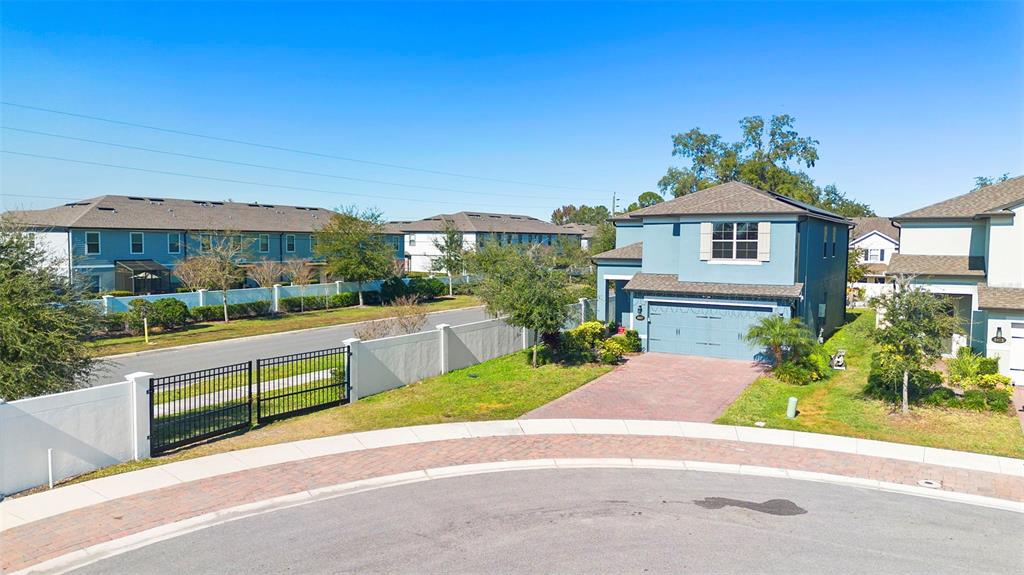 3937 Ceremony Cove Sanford, FL 32771 - Photo 43 of 51 a view of a house with a yard and potted plants