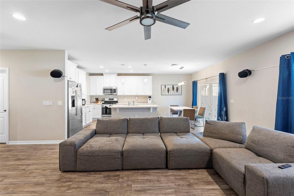 3937 Ceremony Cove Sanford, FL 32771 - Photo 8 of 51 a living room with furniture and a ceiling fan