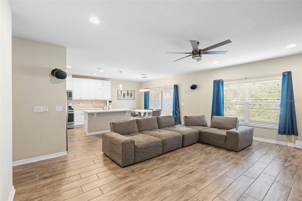 3937 Ceremony Cove Sanford, FL 32771 - Photo 9 of 51 a living room with furniture and a large window