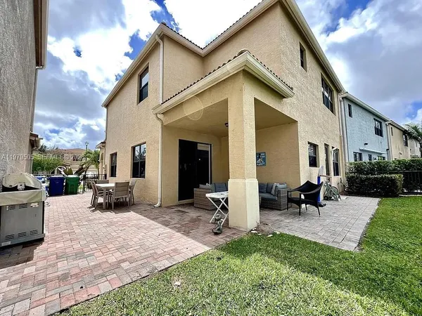 a view of a house with patio