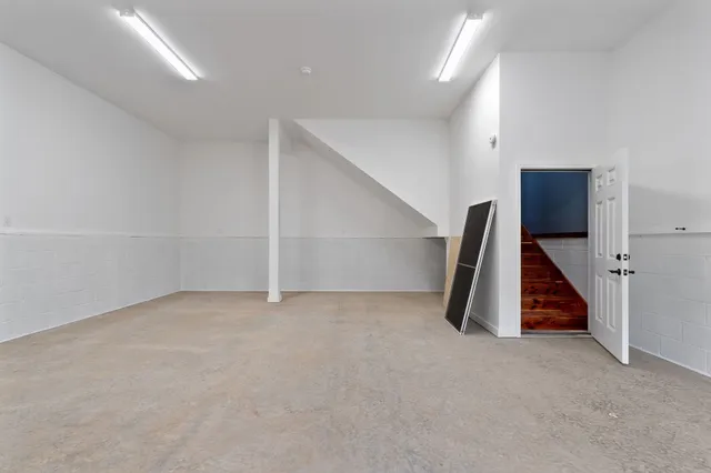 a view of a balcony with wooden floor
