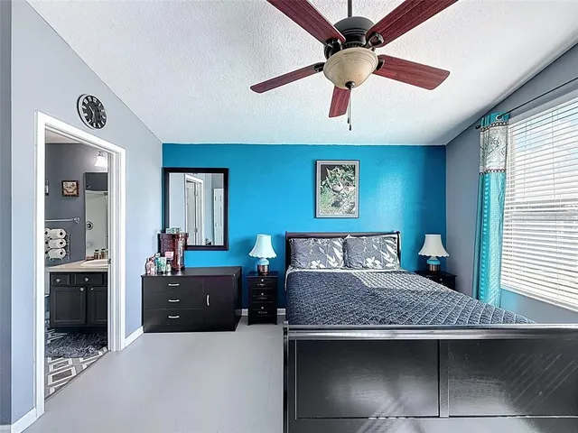 a white refrigerator freezer sitting inside of a kitchen
