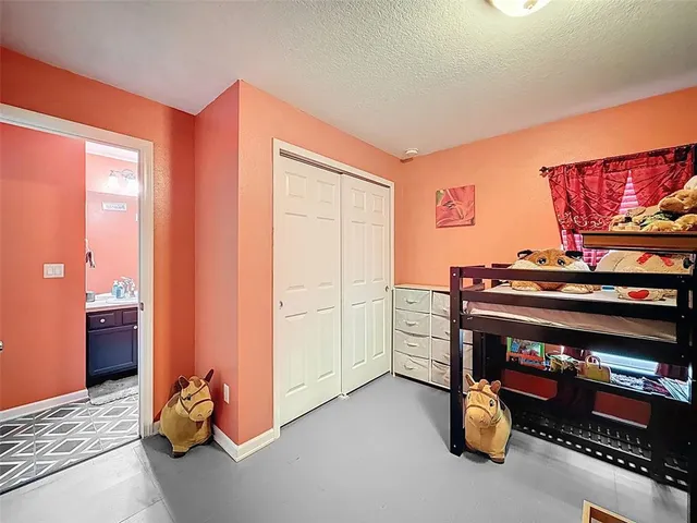 a view of a swimming pool and lounge chair