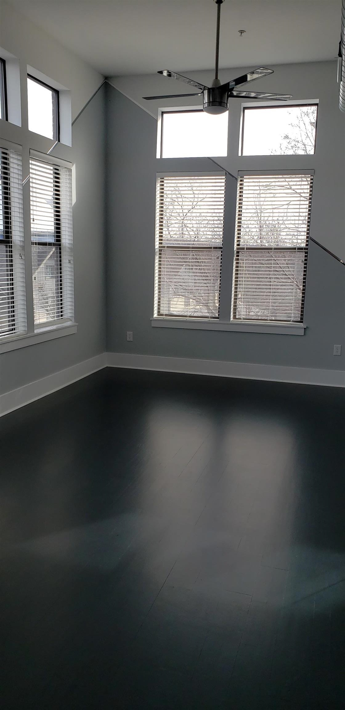 700 Harbor Bend Road, Unit 202 Memphis, TN 38103 - Photo 18 of 18 a view of room with window and wooden floor