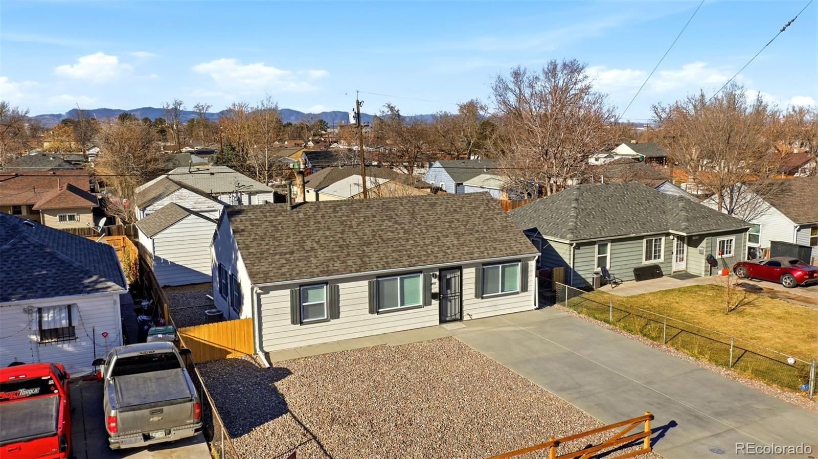 4933 Steele Street Denver, CO 80216 - Photo 26 of 31 an aerial view of multiple houses