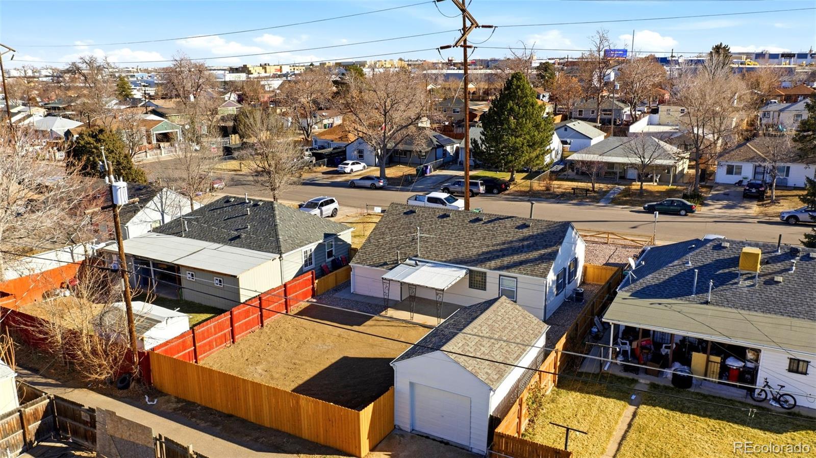 4933 Steele Street Denver, CO 80216 - Photo 29 of 31 an aerial view of a building with outdoor space
