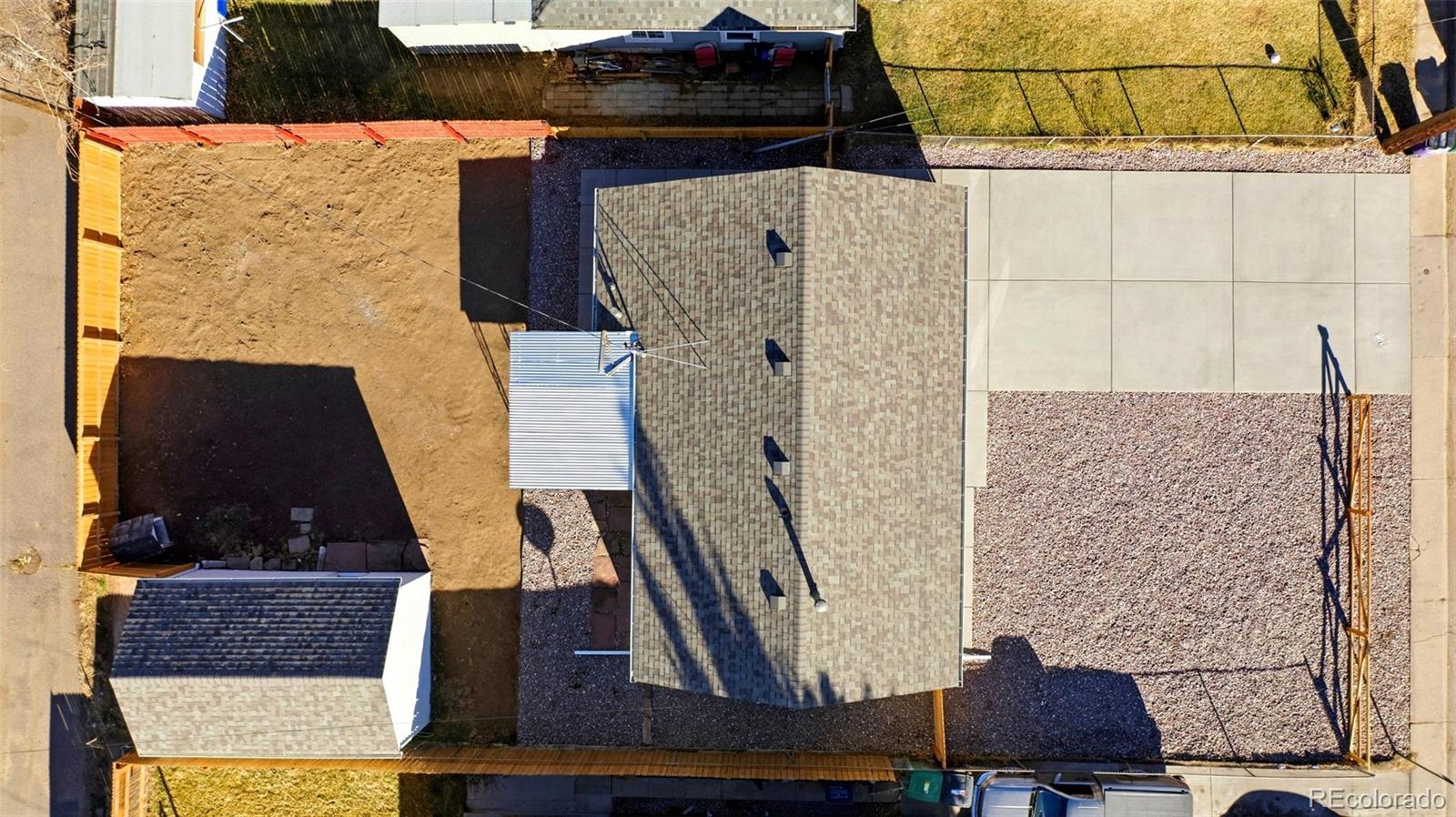 4933 Steele Street Denver, CO 80216 - Photo 31 of 31 view of living room with a rug