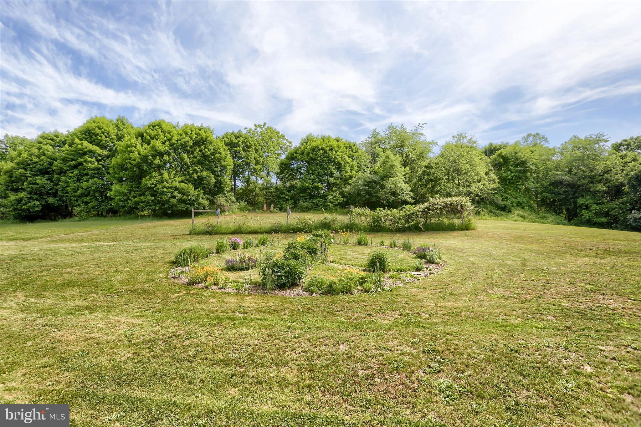 5531 Spring Road Shermans Dale, PA 17090 - Photo 45 of 76 Adore this peace sign flower garden!
