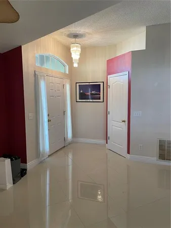 a view of a livingroom with a chair