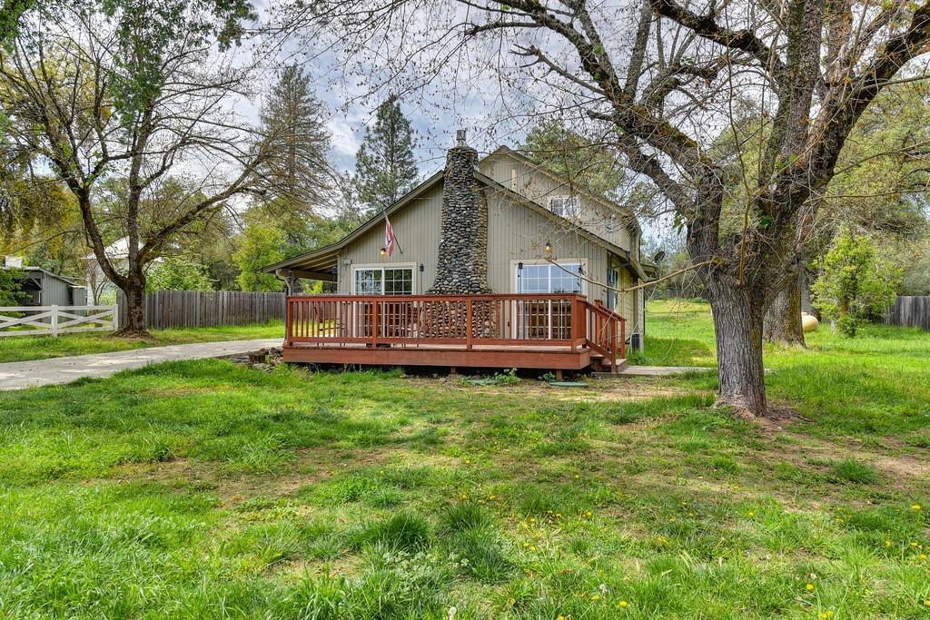 4524 Salmon Falls Road Pilot Hill, CA 95664 - Photo 12 of 47 a view of a house with a yard