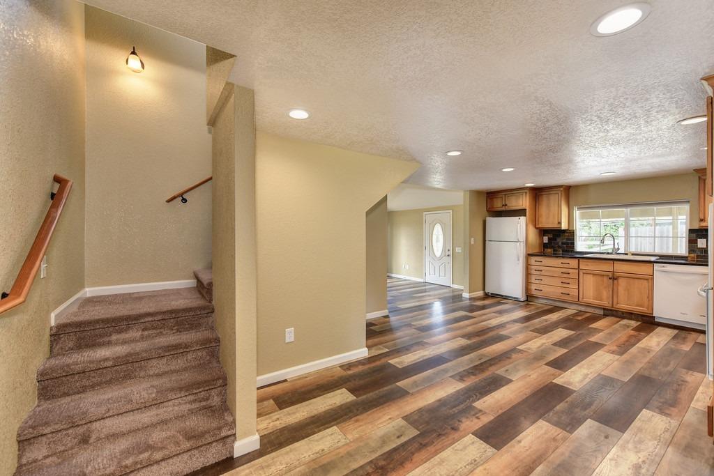 4524 Salmon Falls Road Pilot Hill, CA 95664 - Photo 28 of 47 a view of a kitchen with a refrigerator and a sink