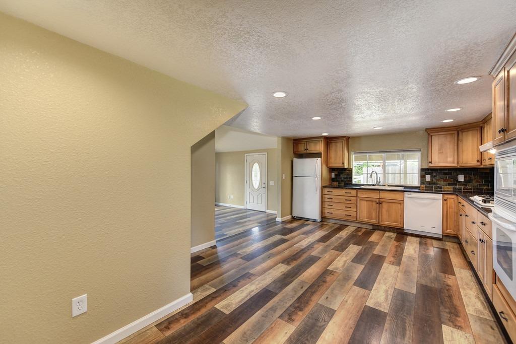 4524 Salmon Falls Road Pilot Hill, CA 95664 - Photo 29 of 47 a view of kitchen with wooden floor