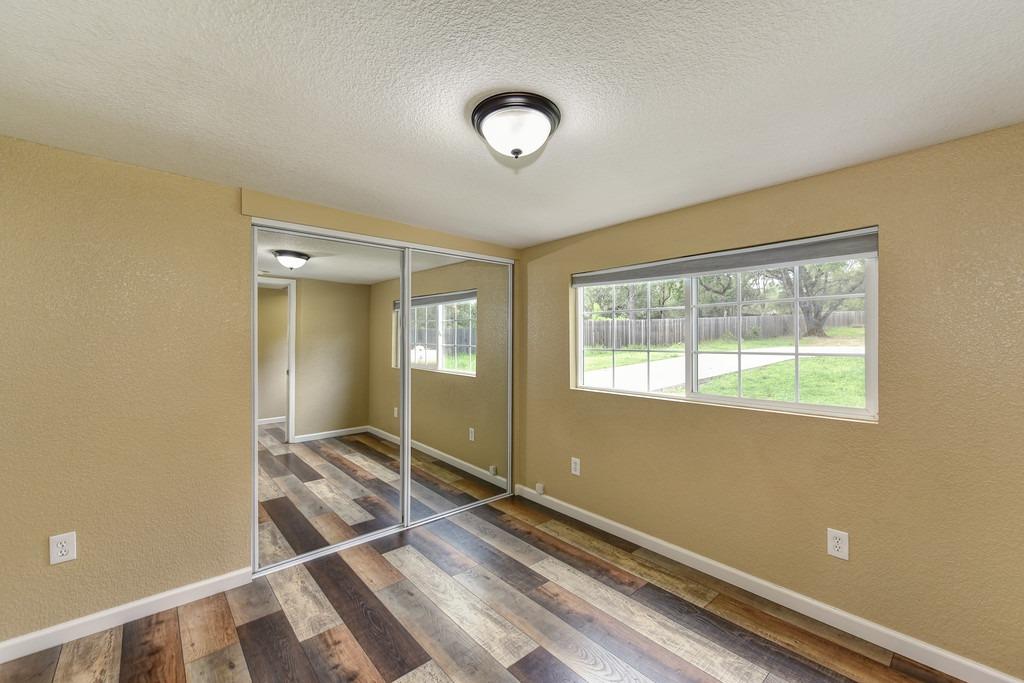 4524 Salmon Falls Road Pilot Hill, CA 95664 - Photo 31 of 47 a view of room with window and a ceiling fan