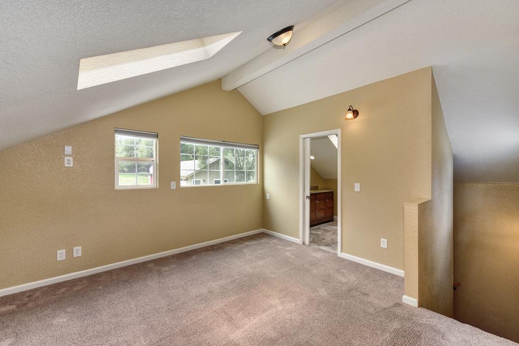 4524 Salmon Falls Road Pilot Hill, CA 95664 - Photo 37 of 47 a view of an empty room with window and closet area