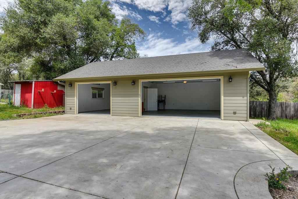 4524 Salmon Falls Road Pilot Hill, CA 95664 - Photo 6 of 47 a front view of house with yard and garage