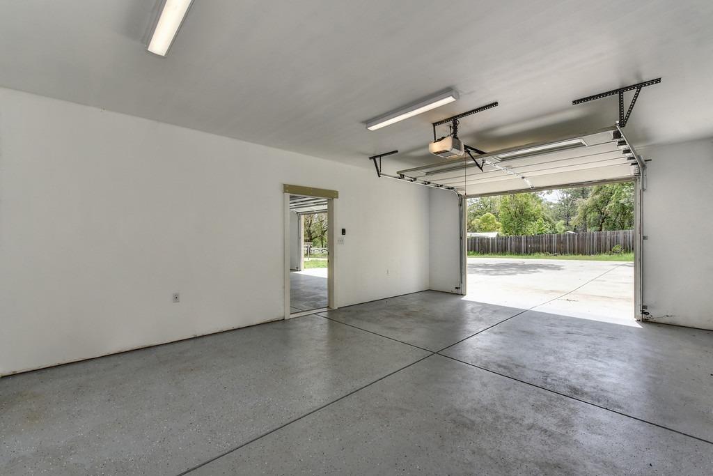 4524 Salmon Falls Road Pilot Hill, CA 95664 - Photo 9 of 47 a view of a livingroom with a ceiling fan and window