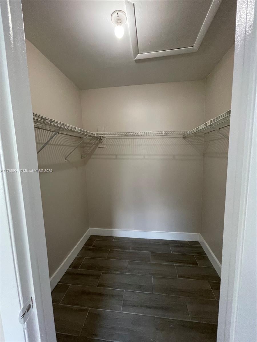 West End Miami, FL 33193 - Photo 8 of 12 a view of an empty walk in closet