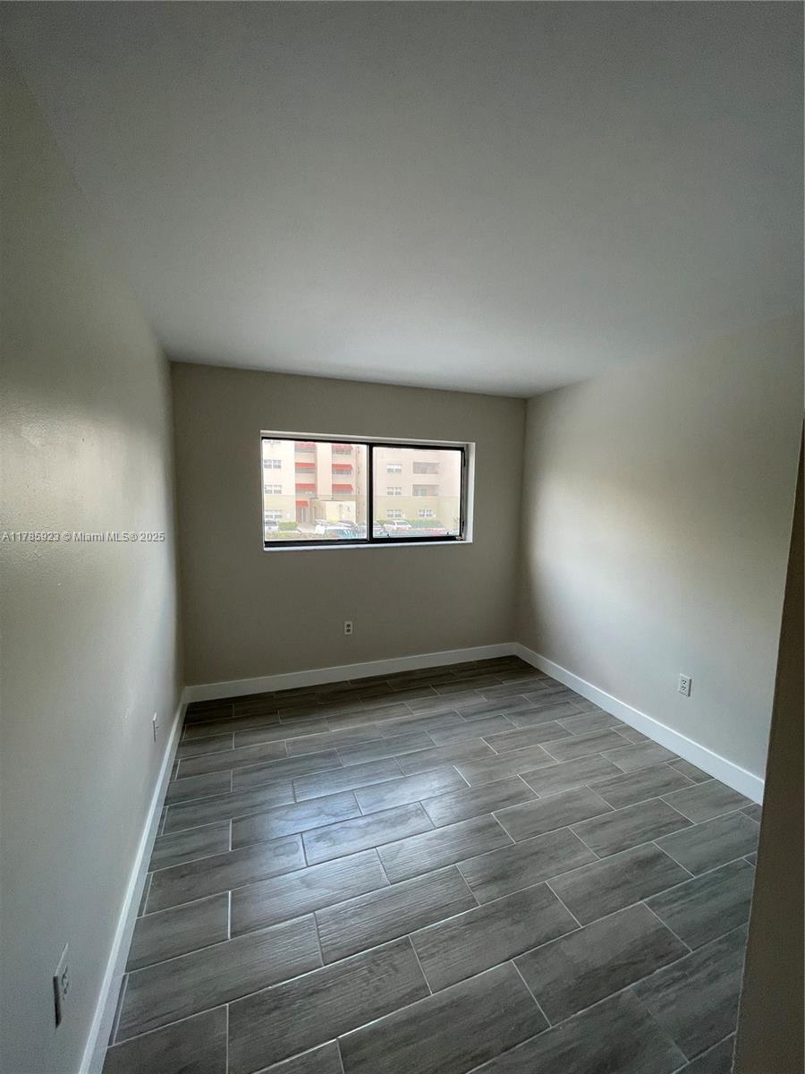 West End Miami, FL 33193 - Photo 9 of 12 a view of an empty room and window