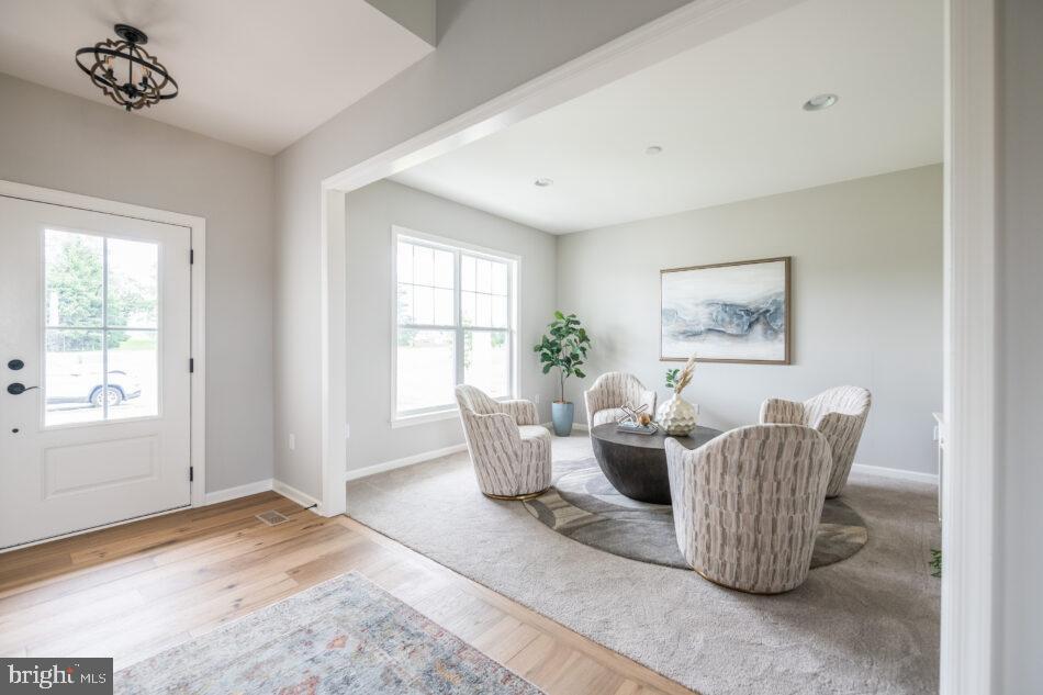 0 Marys Way, Unit ESSINGTON Harrisburg, PA 17112 - Photo 6 of 29 a living room with furniture and a window