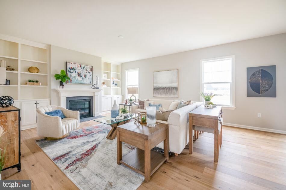 0 Marys Way, Unit ESSINGTON Harrisburg, PA 17112 - Photo 8 of 29 a living room with furniture fireplace and a window