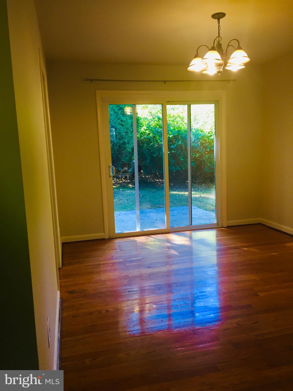 1719 Lorre Drive Rockville, MD 20852 - Photo 9 of 15 formal dining room with SGD to patio and yard
