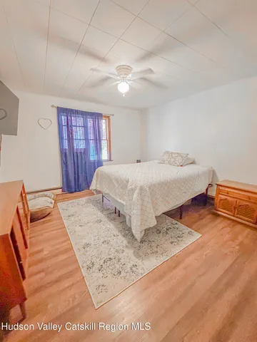 a bed room with a bed and a couch