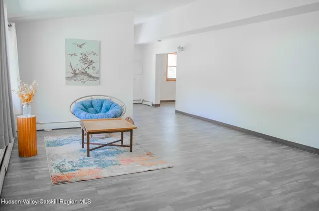 a view of a livingroom with furniture