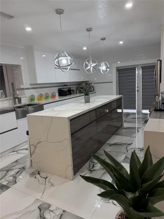 a living room with a couch and a flat screen tv