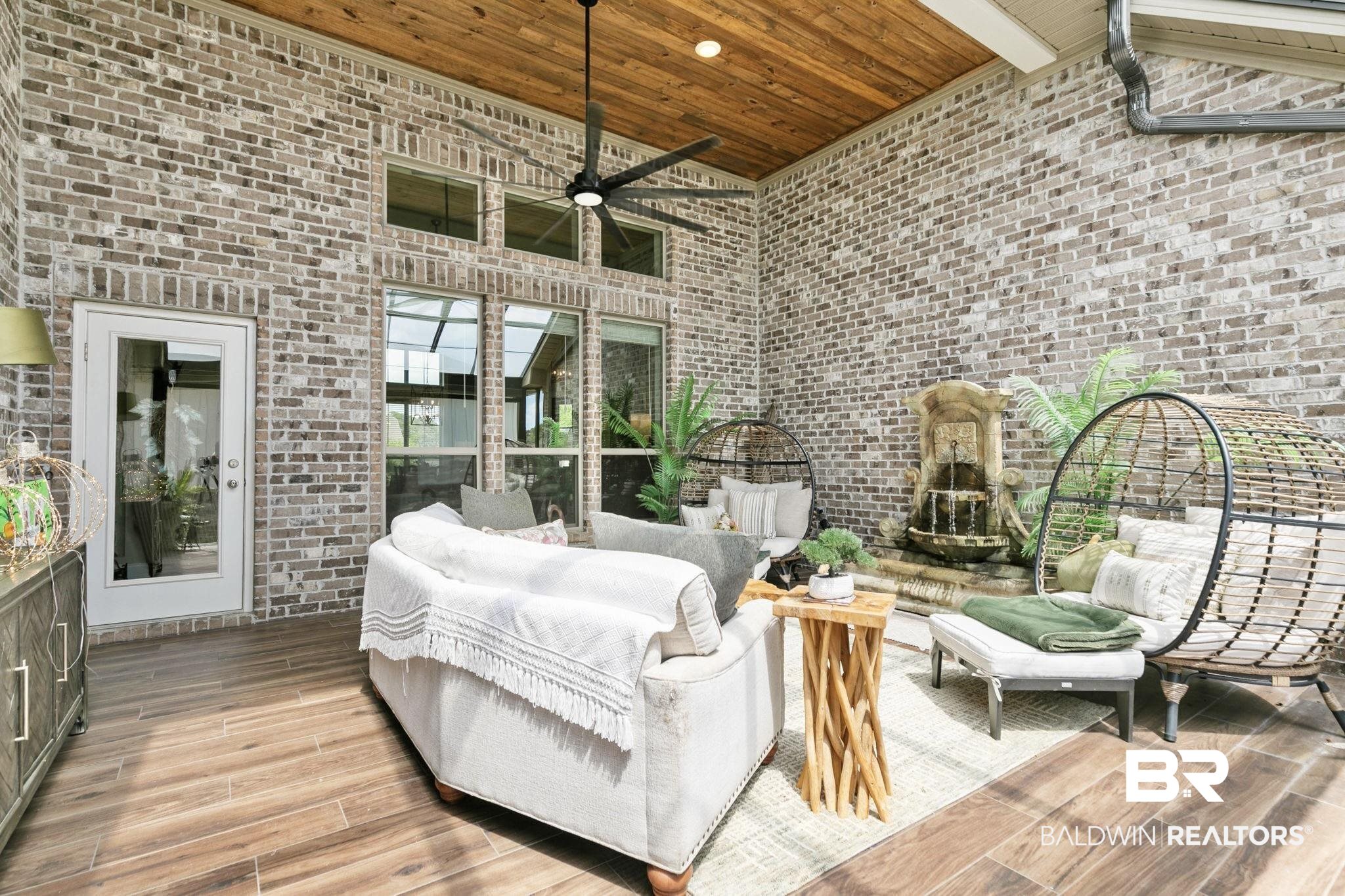 291 Hemlock Drive Fairhope, AL 36532 - Photo 49 of 65 View of patio featuring an outdoor living space with a fireplace and a ceiling fan